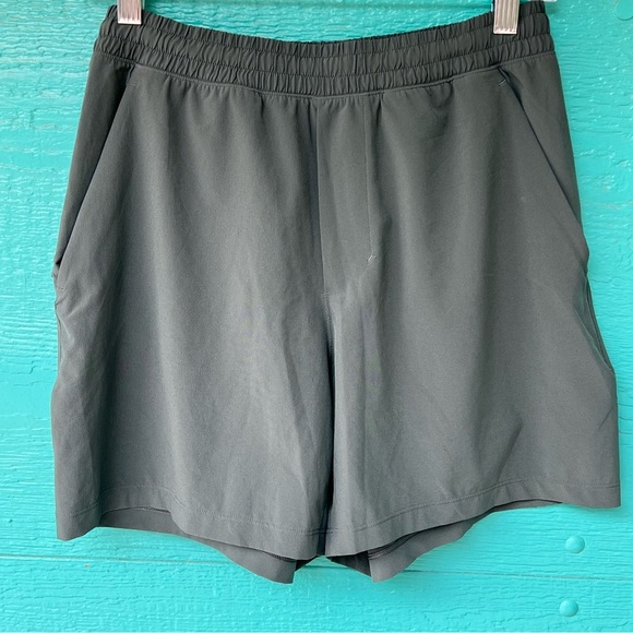LULULEMON OLIVE GREEN SHORTS 5” INSEAM SIDE ZIPPER POCKET SIZE SMALL - Picture 1 of 12